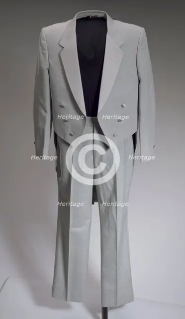 Grey tail coat worn by Cab Calloway, 1976-1995. Creator: After Six.