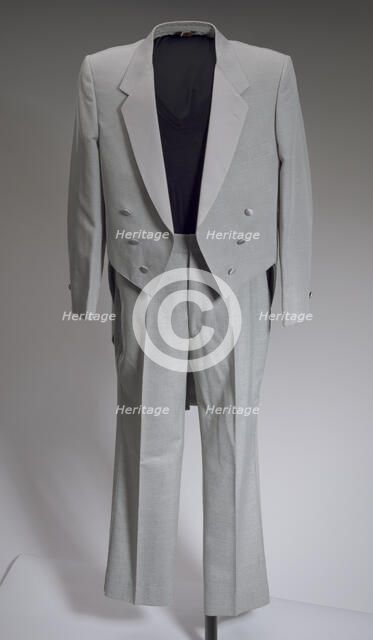 Grey tail coat worn by Cab Calloway, 1976-1995. Creator: After Six.