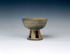 Grey pottery stem bowl with reticulated stem, United Silla Period, Korea, 8th century. Creator: Unknown