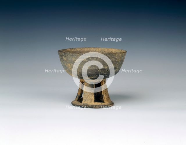 Grey pottery stem bowl with reticulated stem, United Silla Period, Korea, 8th century. Creator: Unknown.