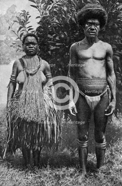 Grief for the dead shown by hempen halters, New Guinea, 1922. Artist: Thomas McMahon