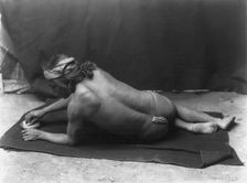 Grinding medicine-Zuni, c1903. Creator: Edward Sheriff Curtis