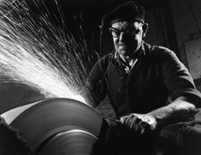 Grinding (sharpening), Everlast Garden tools, Sheffield, South Yorkshire, 1965. Creator: Michael Walters