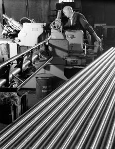 Grinding steel bars at J Beardshaw & Sons, Sheffield, 1963. Creator: Michael Walters
