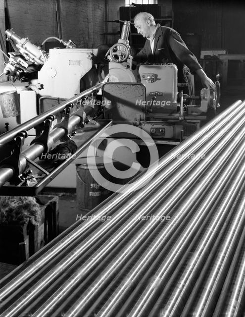 Grinding steel bars at J Beardshaw & Sons, Sheffield, 1963. Creator: Michael Walters.