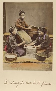 Grinding the rice into flour, about 1873-1883. Creator: Shinichi Suzuki I