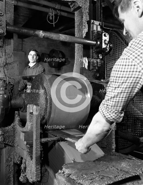 Grinding two metre saw blades at Slack Sellars & Co Ltd, Sheffield, South Yorkshire, 1963. Artist: Michael Walters