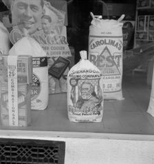 Grocery store window, Mebane, North Carolina, 1939. Creator: Dorothea Lange