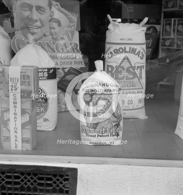 Grocery store window, Mebane, North Carolina, 1939. Creator: Dorothea Lange.