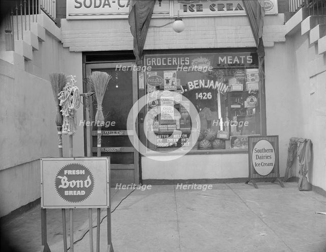 Grocery store across the street from Mrs. Ella Watson..., Washington, D.C., 1942. Creator: Gordon Parks.