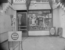 Grocery store across the street from Mrs. Ella Watson..., Washington, D.C., 1942. Creator: Gordon Parks
