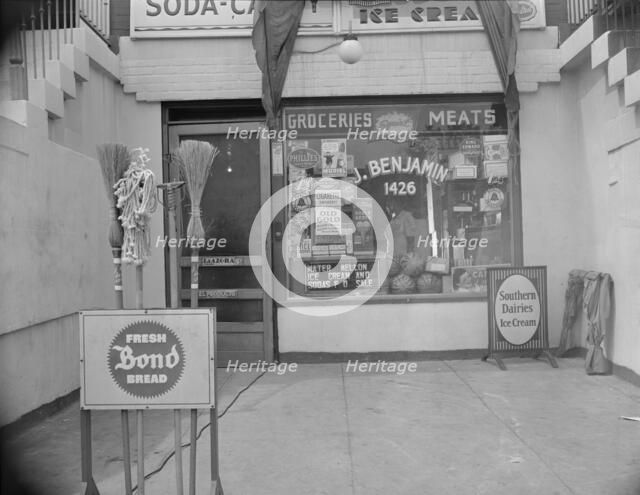 Grocery store across the street from Mrs. Ella Watson..., Washington, D.C., 1942. Creator: Gordon Parks.