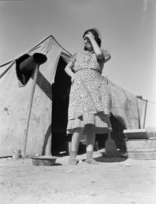 Grower's camp for migrant labor on the edge of the pea fields, near Calipatria, CA, 1939. Creator: Dorothea Lange