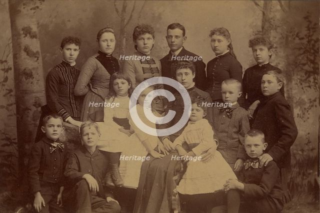 Group family portrait of fifteen people, 1870s. Creator: Unknown.