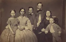 Group family portrait, two women and four children, about 1865. Creator: Unknown