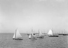 Group of 24 footer yachts racing at Cowes. Creator: Kirk & Sons of Cowes