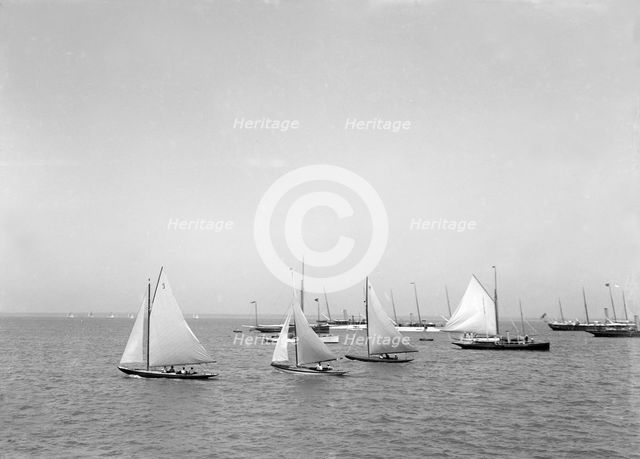 Group of 24 footer yachts racing at Cowes. Creator: Kirk & Sons of Cowes.