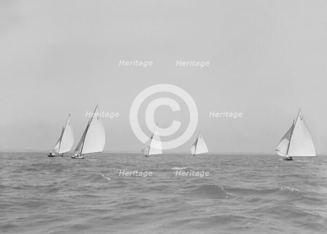 Group of 6 Metres racing downwind, 1911. Creator: Kirk & Sons of Cowes.