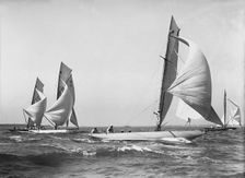 Group of 8 Metres sailing yachts racing downwind, 1911. Creator: Kirk & Sons of Cowes