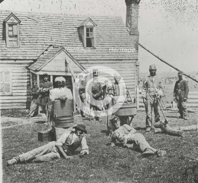 Group of contrabands at Allen's farm house near Williamsburg Road, in the vicinity..., May 1862. Creator: James F. Gibson.