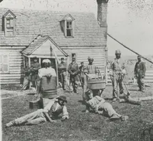Group of contrabands at Allen's farm house near Williamsburg Road, in the vicinity..., May 1862. Creator: James F. Gibson