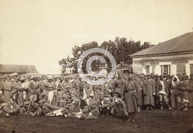 Group of convicts ready to embark on a prison barge, Tiumin [ie, Tiumen], between 1885 and 1886. Creator: Unknown.