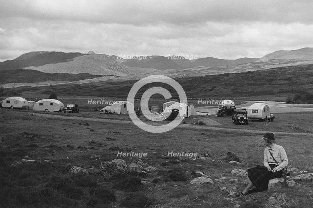 Group of cars and caravans camping in Scottish Highlands 1930's. Creator: Unknown.