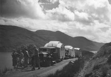 Group of cars and caravans camping in Scottish Highlands 1930's. Creator: Unknown