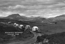 Group of cars and caravans camping in Scottish Highlands 1930's. Creator: Unknown