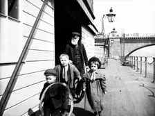 Group of children on Waterloo Pier, London, c1905