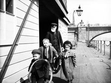 Group of children on Waterloo Pier, London, c1905