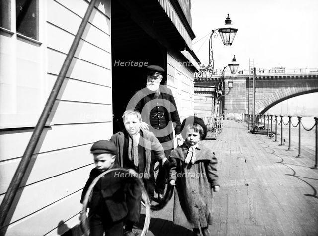 Group of children on Waterloo Pier, London, c1905. Artist: Unknown