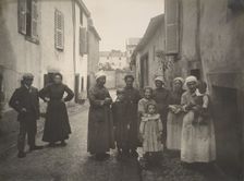 [Group of Adults and Children on a Village Street in the Auvergne], ca. 1910. Creator: Félix Thiollier