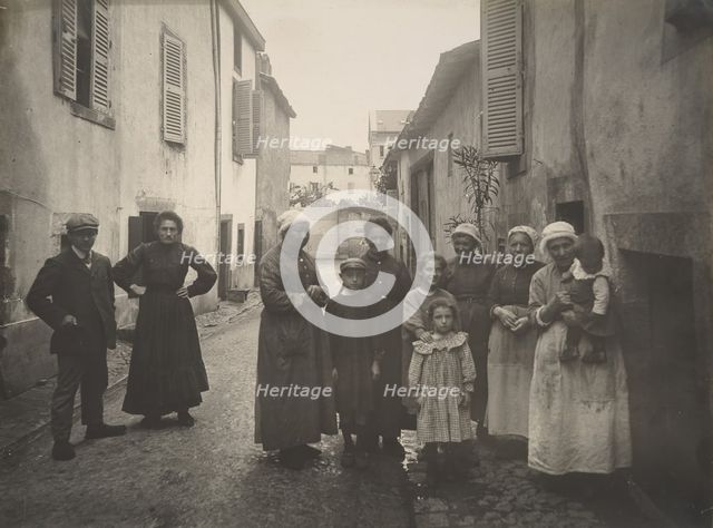 [Group of Adults and Children on a Village Street in the Auvergne], ca. 1910. Creator: Félix Thiollier.