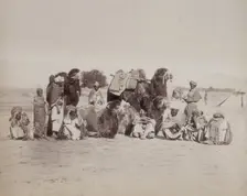 Group of Bactrian camels and camel drivers, Afghanistan, c1879. Creator: Unknown