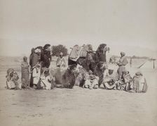 Group of Bactrian camels and camel drivers, Afghanistan, c1879. Creator: Unknown