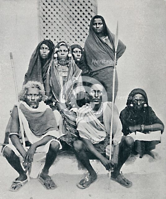 Group of Danakil men and women from the Italian port, Assab Bay, Eritrea, 1912. Artist: Unknown.