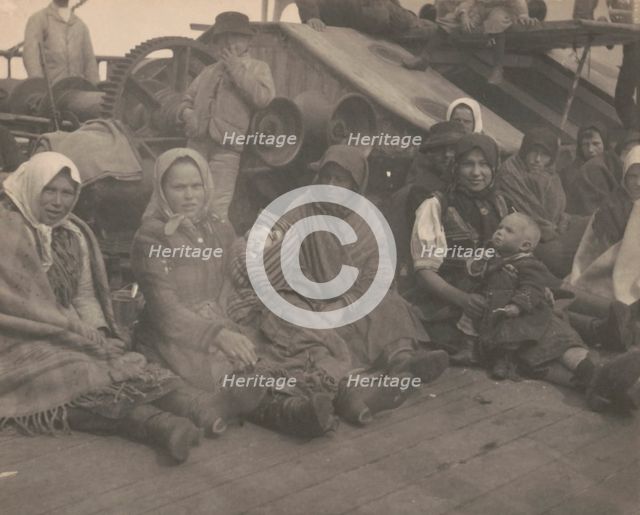 Group of emigrants (women and children) from eastern Europe on deck of the S.S. Amsterdam, 1899. Creator: Frances Benjamin Johnston.