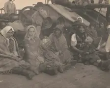 Group of emigrants (women and children) from eastern Europe on deck of the S.S. Amsterdam, 1899. Creator: Frances Benjamin Johnston