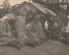 Group of emigrants (women and children) from eastern Europe on deck of the S.S. Amsterdam, 1899. Creator: Frances Benjamin Johnston