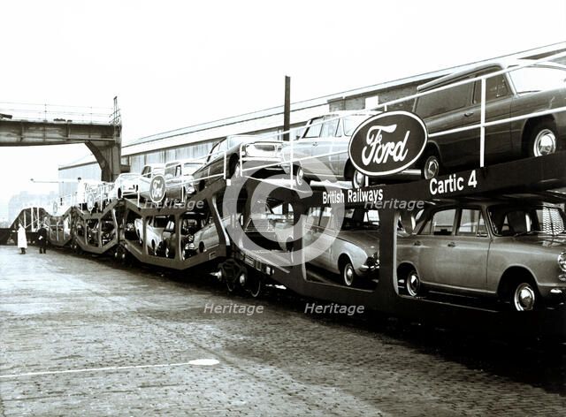 Group of engineers, engine drivers and members of the Company, with the train engine that made th…
