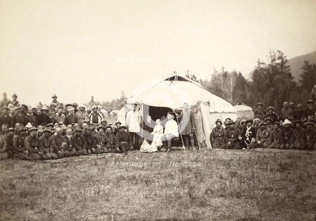 Group of Kirghiz (ie Kazakh) men posing with a local Russian Governor, his..., between 1885 and 86. Creator: Unknown.