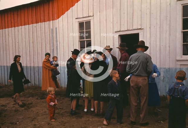 Group of homesteaders in front of the bean house ..., Pie Town, New Mexico Fair, 1940. Creator: Russell Lee.