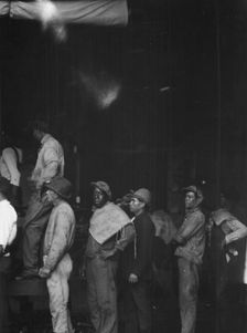 Group of laborers, New Orleans or Charleston, South Carolina, between 1920 and 1926. Creator: Arnold Genthe