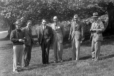 Group of men at Donington Park motor racing circuit, Leicestershire, c1930s. Artist: Bill Brunell