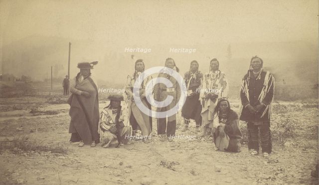 Group of Native American Men, Telegraph Poles in Background, 1880s-90s. Creator: Unknown.