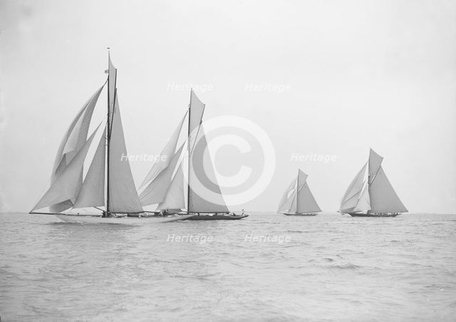 Group of sailing cutters racing: 'Ma'oona', 'Bloodhound', 'Sonya' and 'Creole', 1913.  Creator: Kirk & Sons of Cowes.