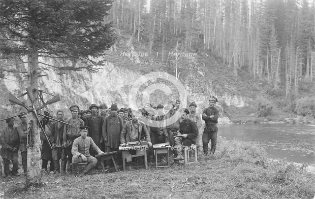 Group of Shoria Men with Members of the Land-Management Expedition, 1913. Creator: GI Ivanov.