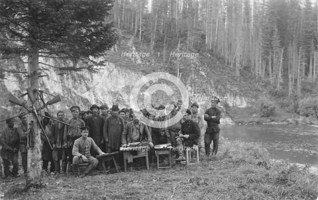 Group of Shoria Men with Members of the Land-Management Expedition, 1913. Creator: GI Ivanov.