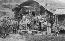 Group of Shoria Men; a Hunter, in Front, Equipped for a Winter Hunt by the Members..., 1913. Creator: GI Ivanov